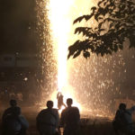 Man holding handheld fireworks at a festival in Mashiko nearby Tokyo