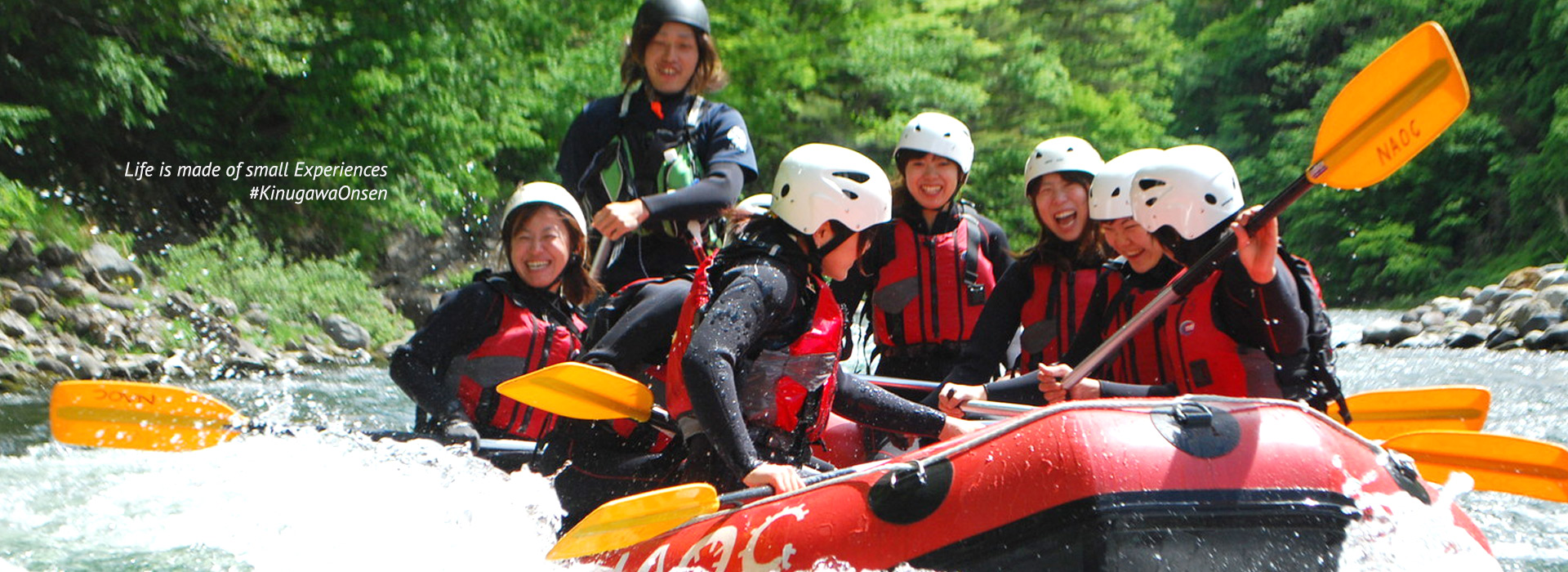 Excited visitors enjoying rafting and canyoning activities down a river in Kinugawa valley near Tokyo