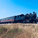 Stream train passing through fields towards Mashiko